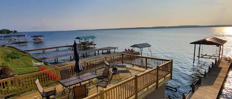 Brand new beautiful upperboat house deck with grill and lots of seating 