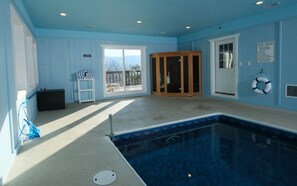 Splash in style with a sauna and mountain views in your cabin escape.