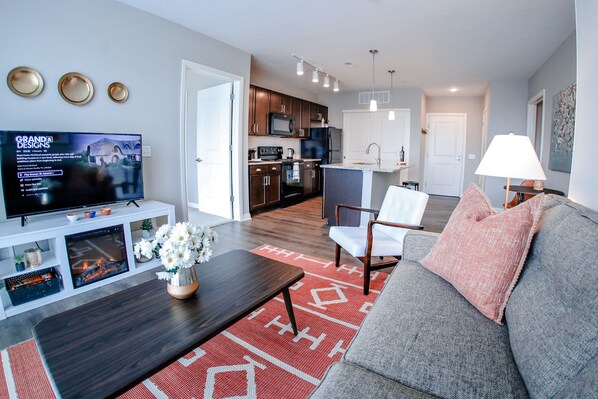 The living room includes an electronic fireplace and 50" Smart ROKU TV with complimentary DirecTV for all your favorite movies, TV shows, and local channels.  