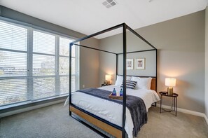This queen size canopy bed is a highlight! Hotel quality sheets with 4 pillows. Trust us: this bed is so cozy, you'll hit snooze at least 3 extra times. :P 