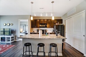 Kitchen island is perfect for getting some work done, enjoying a bowl of cereal, or spreading out snacks for friends! 