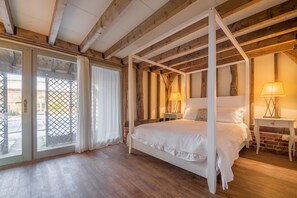 Rose and Court Barn, Stoke by Layland: Court Barn ground floor double bedroom with door to swimming pool area