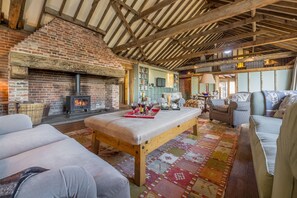 Rose and Court Barn, Stoke by Layland: Court Barn ground floor living space with fireplace and wood burning stove