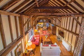 Rose and Court Barn, Stoke by Layland:  View from Rose Barn mezzanine onto open-plan living space