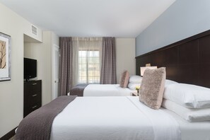 There are 2 Double beds in the bedroom.