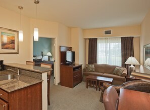 Sink into the cozy sofa after a day exploring the area.