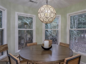 Dining room seating for 8 with beautiful windows and views