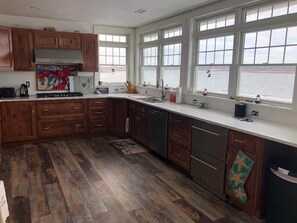 The 2nd fl kitchen is a show place with gorgeous views and beautiful decor