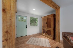Front entry. Games and surround sound stereo located in armoire.