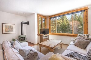 Living room with views of the ski runs at Northstar