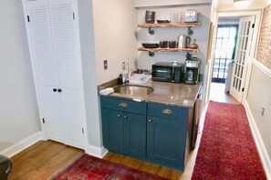 Bijou kitchenette is perfect for preparing small meals 