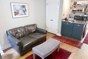 Comfy leather couch to sit and relax after a full day of exploring!
