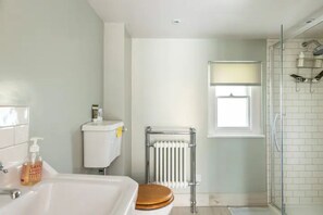 Bathroom with heated towel rail & underfloor heating.