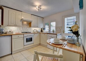 The lovely cottage style kitchen and dining room