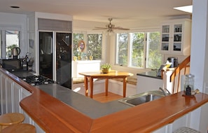 Open eat-in kitchen filled with lots of natural light.