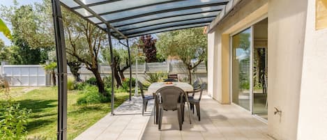 Plant, Property, Table, Furniture, Shade, Chair, Outdoor Furniture, Residential Area, Leisure, Building