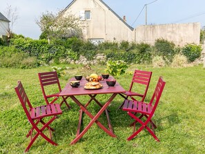 Plant, Table, Furniture, Sky, Chair, Natural Landscape, Outdoor Table, Botany, Outdoor Furniture, Tableware