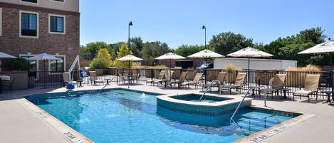 Dive into the outdoor pool on a hot summer day.
