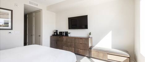 King bed with wall mounted TV