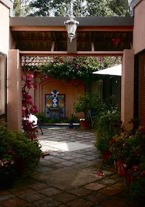 Enjoy the peace of a garden courtyard