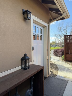 Entry door.  Lockbox for key  mounted on doorframe for easy access.  