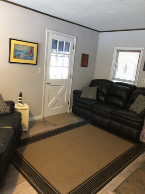 Sitting room coming in from the garage