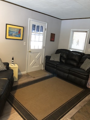 Sitting room coming in from the garage