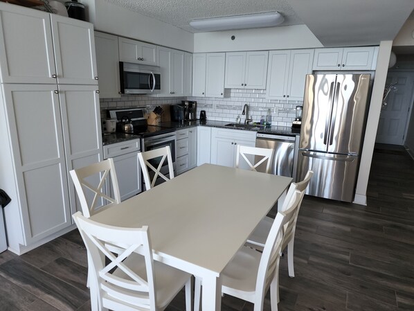 new kitchen, new appliances and everything needed to cook most dishes