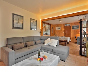 Couch, Furniture, Property, Picture Frame, Table, Living Room, Interior Design, Studio Couch, Floor, Wall