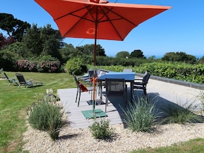 Plant, Table, Property, Plant Community, Furniture, Nature, Tree, Sky, Umbrella, Shade