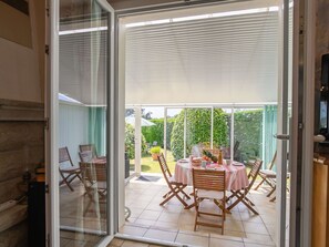 Furniture, Chair, Building, Plant, Wood, Shade, Door, Interior Design, Floor, Comfort