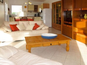Furniture, Room, Property, Living Room, Interior Design, Table, Coffee Table, Floor, Building, House