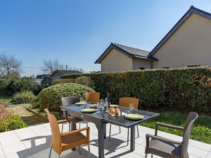 Plant, Sky, Furniture, Table, Property, Building, Chair, Shade, Outdoor Furniture, Architecture
