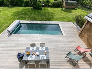 Water, Plant, Table, Outdoor Furniture, Wood, Building, Road Surface, Rectangle, Leisure, Grass