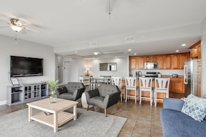 Everyone will enjoy the large living, dining kitchen area.