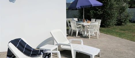 Furniture, Property, Sky, Table, Umbrella, Plant, Outdoor Furniture, Shade, Outdoor Table, Chair