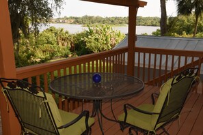 Relax on covered deck w/ view of lake. Enjoy coffee sunrises & cocktail sunsets!