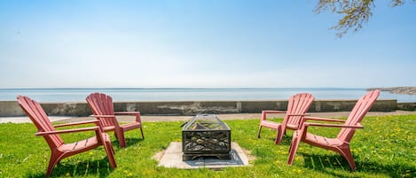 Firepit area with full waterfront view.