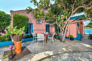 A cozy sitting area right next to your unit, perfect for relaxing with a drink or a bite to eat. Just steps away from the beach.