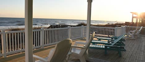 Deck overlooking and just steps from beach and ocean