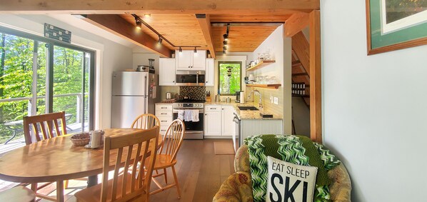 The kitchen, dining area, and living room are an open-floor concept.