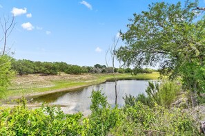 Unwind with tranquil pond views and rolling hills-your serene escape into nature starts here.