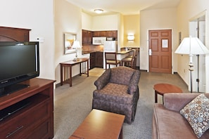 Sink into the cozy sofa after a day exploring the area.