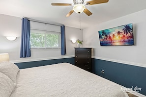 Master bedroom with King size bed and 55" smart tv