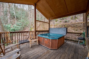enjoy a soak in the tub on the covered deck