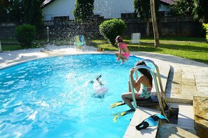 Kids having fun in the pool