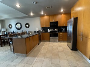Fully stocked kitchen for cooking.  Drip coffee maker & Keurig. 