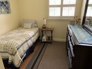 Twin size bed in smaller bedroom.