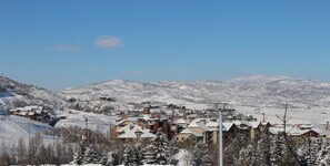 Awesome views from our living room window of the bucket chairlift and mountains!
