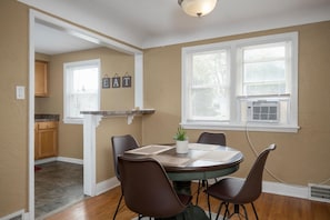 Seating for 4 guests in dining room